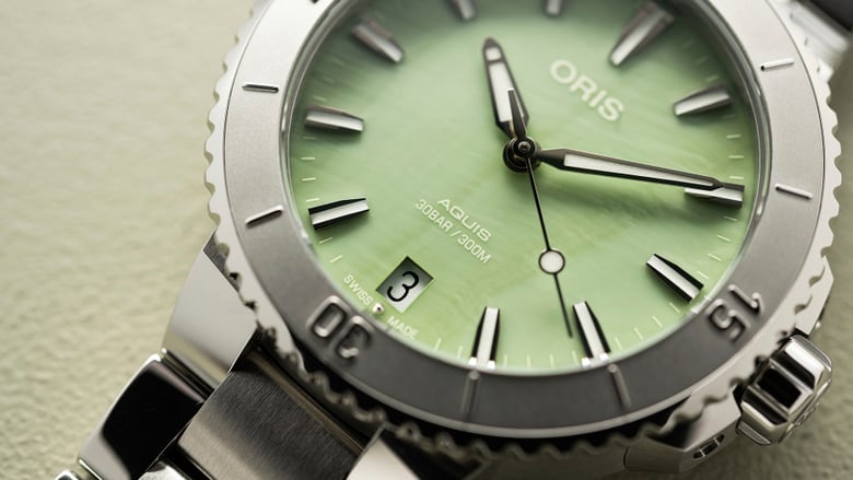 Aquis Date 01 733 7770 4157 07 8 18 05P Oris